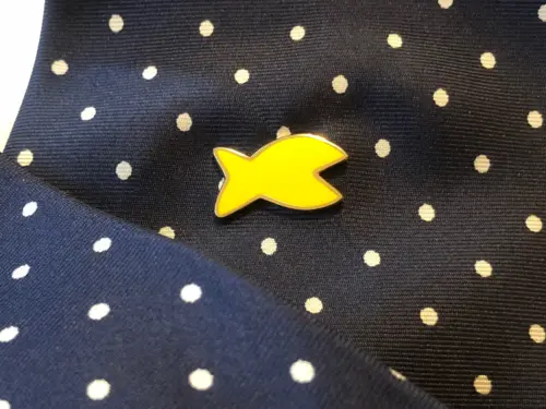FISH! lapel pin. Small, dazzling and visible. Give it to the employee that must be recognized for being there, for making their day, for being good at choosing his attitude.
