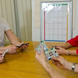 Team activity: Simbols puzzle: Simbols addresses communication skills, team planning and implementation, process improvement and team leadership in a lively, although at times frustrating, way. Simbols works well with groups of between 5 and 15 people and